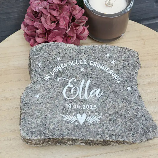 Granite memorial stone with engraving motif “In loving memory”